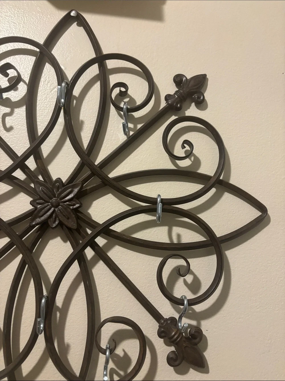 Decorative metal wall hanging jewelry holder